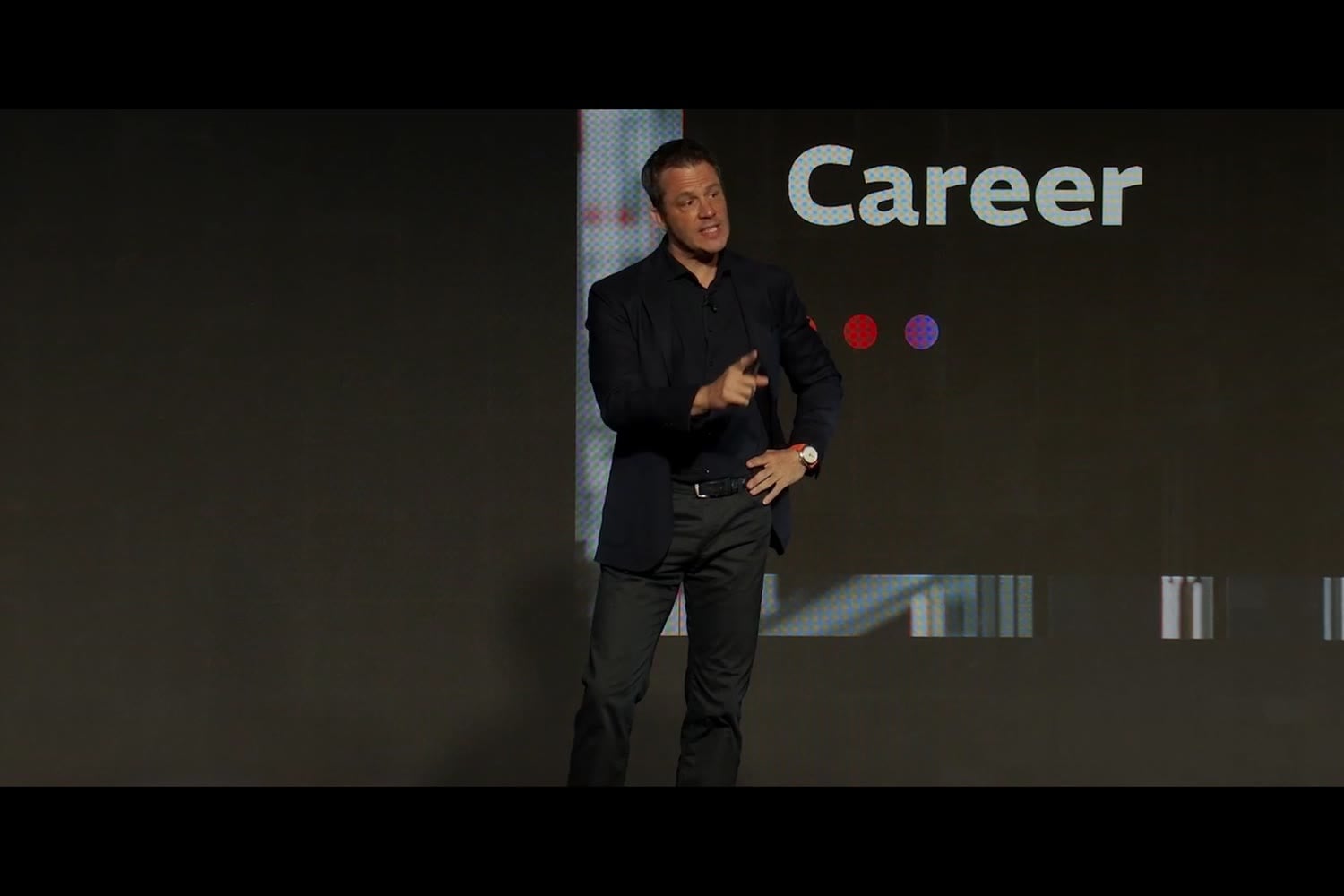 Ryan Estis presenting on stage