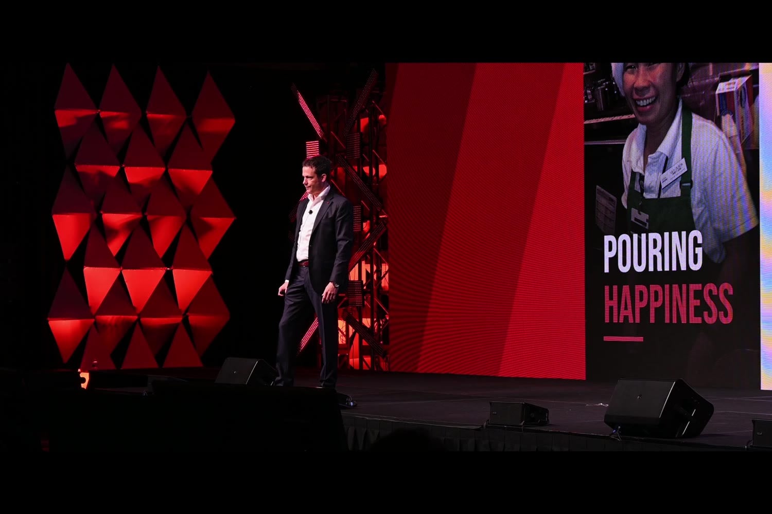 Ryan Estis on stage delivering a keynote